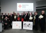Rotes Kreuz mit Briefmarke und Jubiläumsmünze geehrt