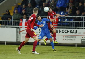 Fussball. Regionalliga Suedwest. Saison 2016-2017. 24. Spieltag. FC Astoria Walldorf -TSG Hoffenheim II. Yakup Polat (FCA Walldorf) gegen Robin Szarka (TSG Hoffenheim II). 09.12.2016 - Jan A. Pfeifer - 01726290959